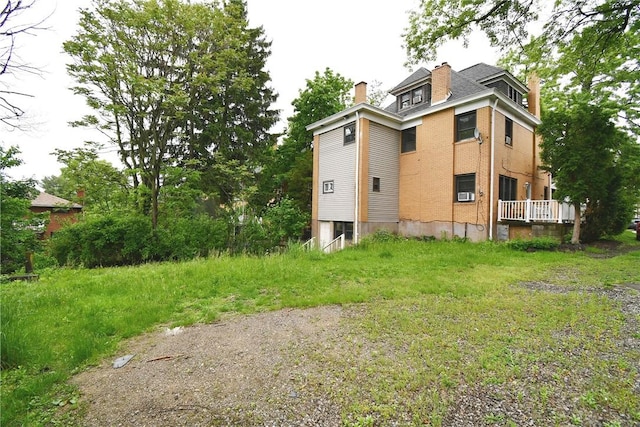 21 Hillson Ave, Brentwood, PA 15227 - rear view of house with a chimney
