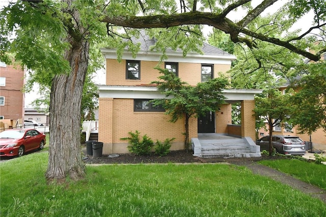 21 Hillson Ave, Brentwood, PA 15227 - american foursquare style home featuring brick siding and a front lawn