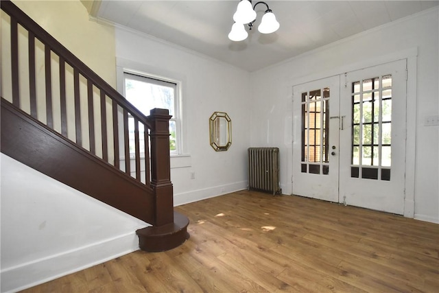 21 Hillson Ave, Brentwood, PA 15227 - entryway featuring radiator, ornamental molding, a chandelier, stairs, and french doors