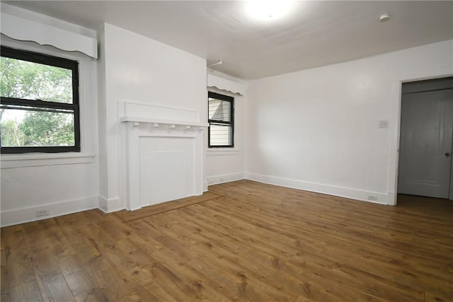 21 Hillson Ave, Brentwood, PA 15227 - unfurnished living room featuring wood finished floors and baseboards
