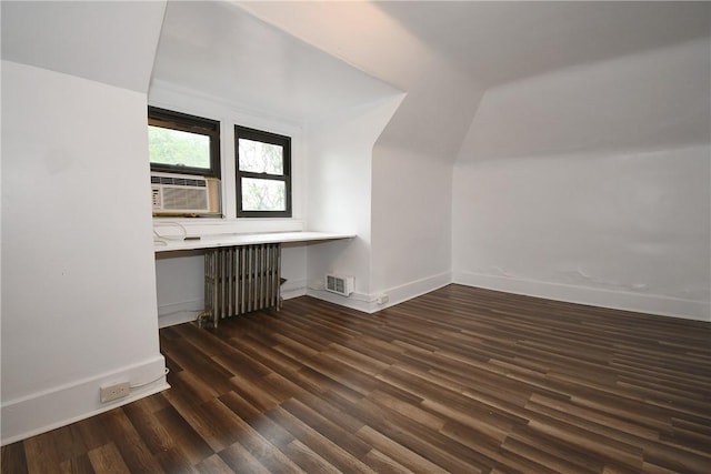 21 Hillson Ave, Brentwood, PA 15227 - additional living space with radiator heating unit, lofted ceiling, wood finished floors, baseboards, and cooling unit