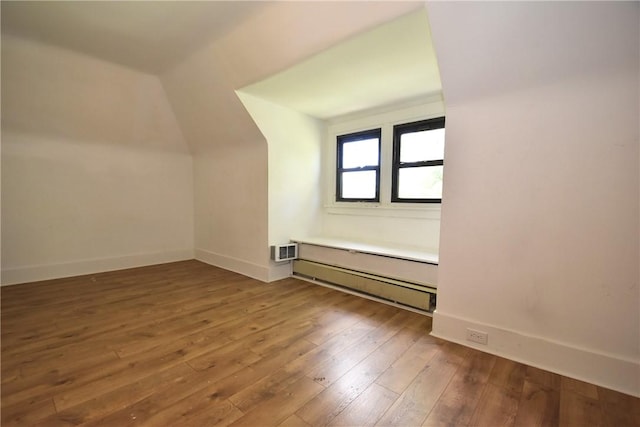 21 Hillson Ave, Brentwood, PA 15227 - additional living space with wood-type flooring, lofted ceiling, and baseboards