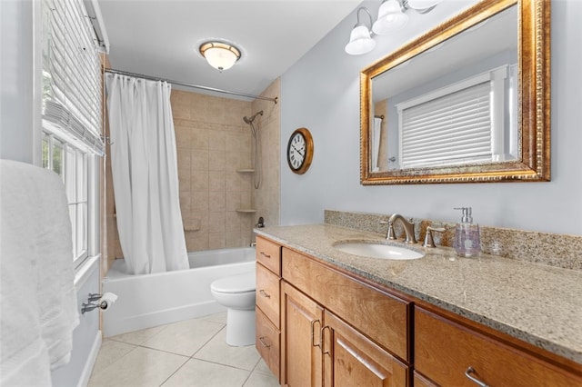 bathroom featuring tile patterned flooring, vanity, shower / tub combo with curtain, and toilet