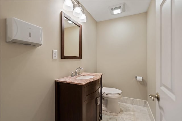 396 4th St, Beaver, PA 15009 - half bathroom with marble finish floors, toilet, baseboards, and vanity