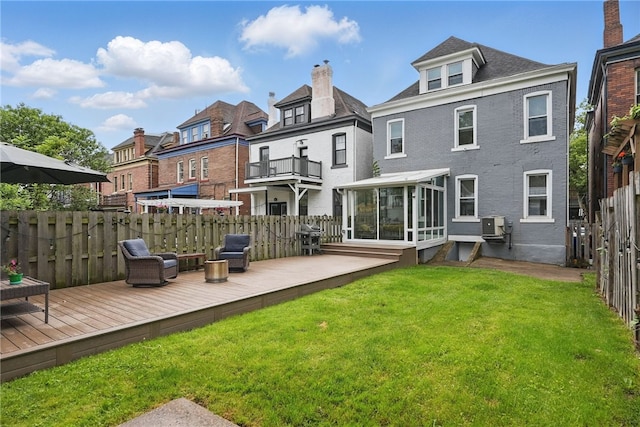 608 N Euclid Ave, East Liberty, PA 15206 - back of property with a wooden deck, a sunroom, a residential view, and ac unit