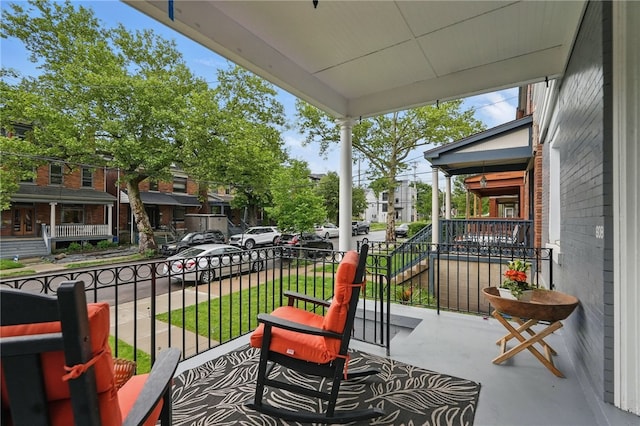 608 N Euclid Ave, East Liberty, PA 15206 - balcony featuring covered porch and a residential view
