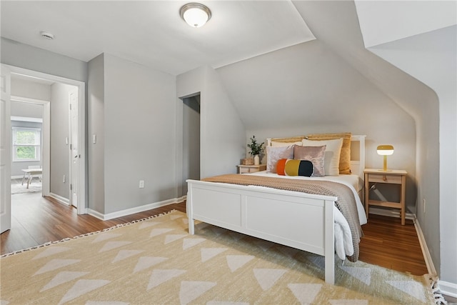 608 N Euclid Ave, East Liberty, PA 15206 - bedroom with wood finished floors, lofted ceiling, and baseboards
