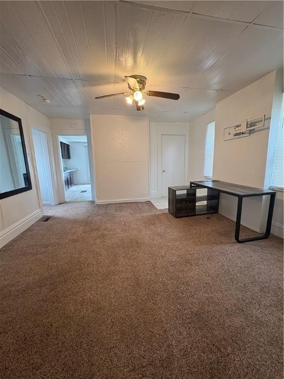 2216 Cronemeyer St, Mckeesport, PA 15132 - carpeted spare room with a ceiling fan and baseboards