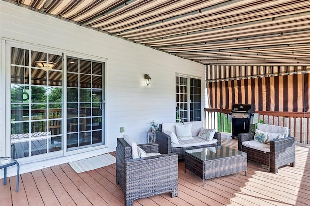 deck featuring an outdoor hangout area and a grill