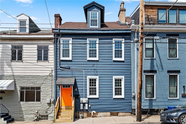 3423 Denny St, Lawrenceville, PA 15201 - view of property featuring entry steps and a chimney