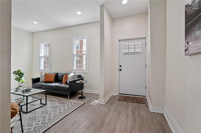 3423 Denny St, Lawrenceville, PA 15201 - foyer featuring wood finished floors, baseboards, and recessed lighting