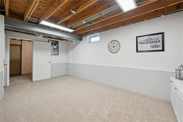 basement with carpet flooring