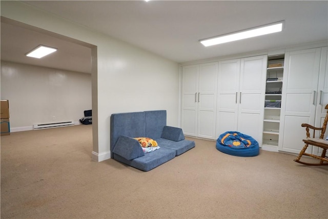 605 E Portersville Rd, Muddy Creek Twp, PA 16051 - living area featuring baseboard heating, carpet, and baseboards