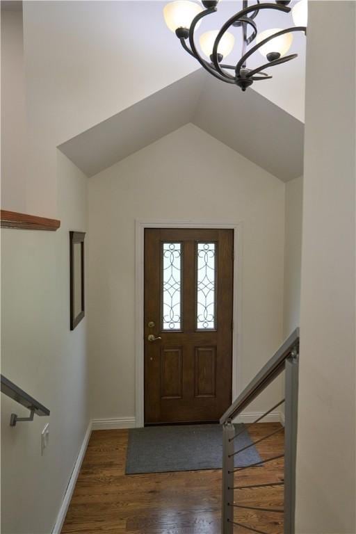 605 E Portersville Rd, Muddy Creek Twp, PA 16051 - entrance foyer featuring a chandelier, wood finished floors, lofted ceiling, and baseboards