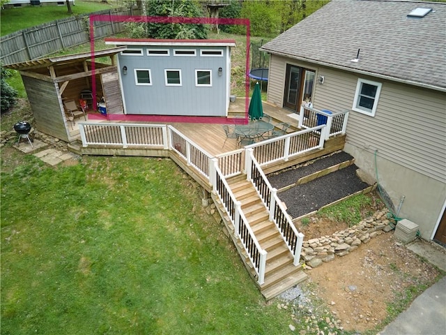 605 E Portersville Rd, Muddy Creek Twp, PA 16051 - rear view of house featuring a wooden deck, a lawn, and stairs