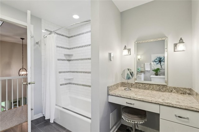bathroom with shower / bathtub combination with curtain, tile patterned flooring, and vanity