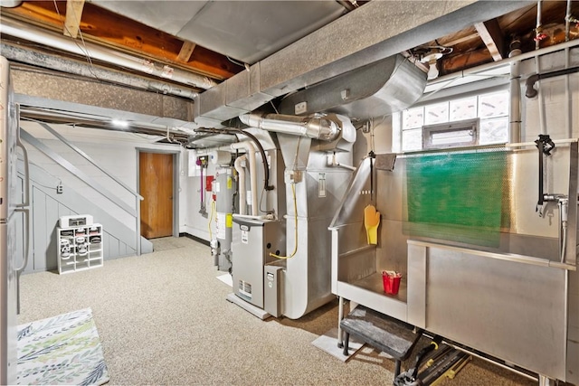 1009 Connor Rd, Castle Shannon, PA 15234 - basement featuring gas water heater, heating unit, and carpet