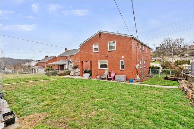 1009 Connor Rd, Castle Shannon, PA 15234 - back of house featuring a patio and brick siding