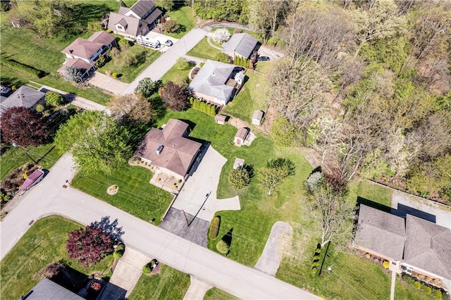 aerial view of property's location featuring nearby suburban area