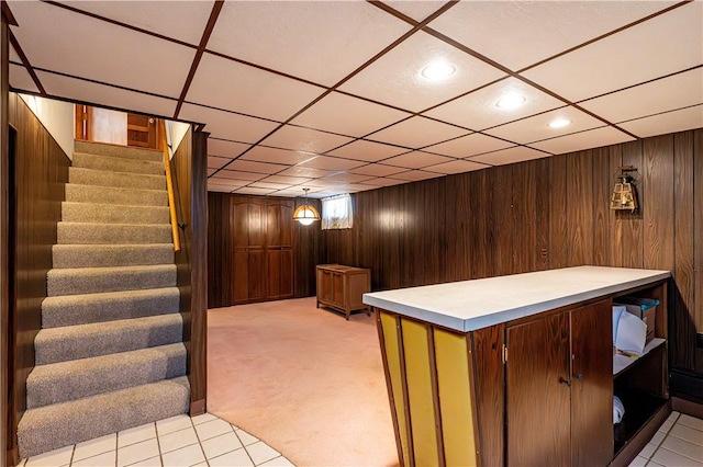 interior space with stairway, wooden walls, light carpet, and recessed lighting