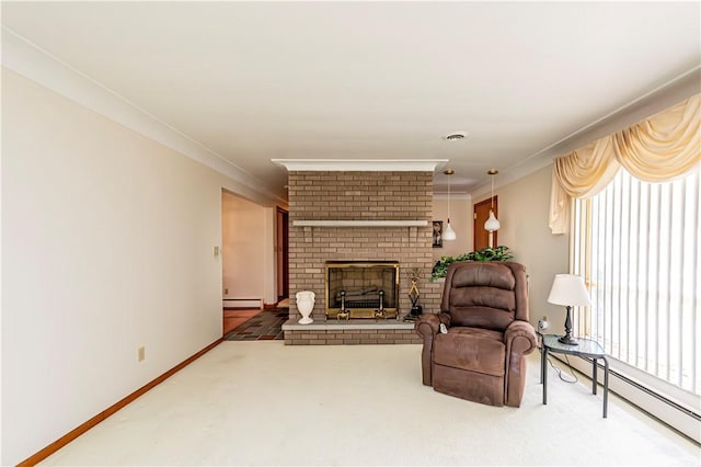 living room with a baseboard heating unit, carpet floors, healthy amount of natural light, crown molding, and a fireplace