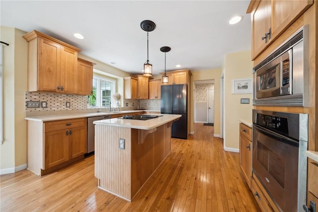 430 Southfield Dr, Hempfield Twp Wml, PA 15601 - kitchen featuring black appliances, backsplash, light countertops, and recessed lighting
