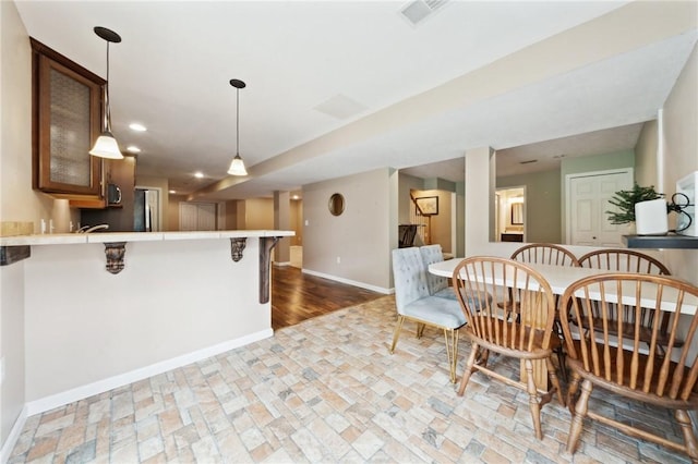 430 Southfield Dr, Hempfield Twp Wml, PA 15601 - dining area with baseboards and recessed lighting