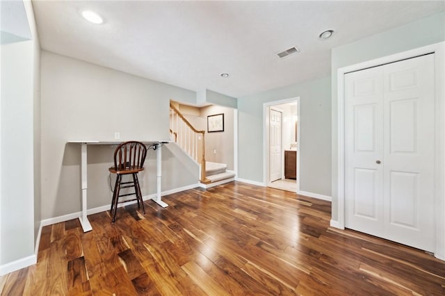430 Southfield Dr, Hempfield Twp Wml, PA 15601 - spare room featuring stairs, wood finished floors, baseboards, and recessed lighting