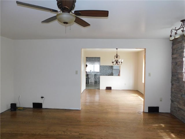 110 Holbert Stretch Rd, Bobtown/Dilliner, PA 15327 - unfurnished room featuring wood finished floors, a chandelier, and ceiling fan