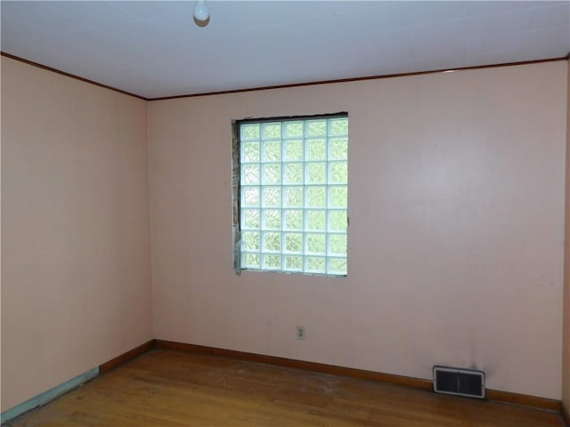 110 Holbert Stretch Rd, Bobtown/Dilliner, PA 15327 - empty room with wood finished floors, ornamental molding, and baseboards