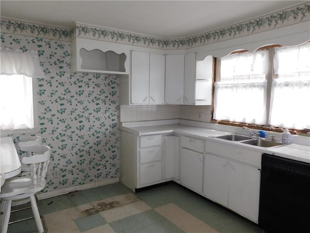 110 Holbert Stretch Rd, Bobtown/Dilliner, PA 15327 - kitchen featuring black dishwasher, a sink, light flooring, and light countertops