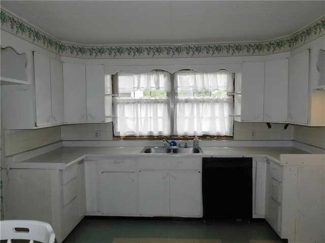 110 Holbert Stretch Rd, Bobtown/Dilliner, PA 15327 - kitchen featuring black dishwasher, a sink, white cabinetry, and tasteful backsplash