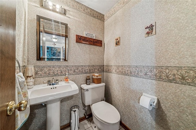 620 Sandy Hill Rd, Manor, PA 15642 - half bathroom featuring toilet and tile patterned floors