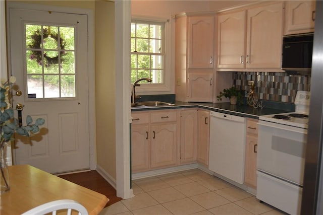 103 Boxwood Ct, Peters Twp, PA 15317 - kitchen featuring white appliances, a sink, dark countertops, and plenty of natural light