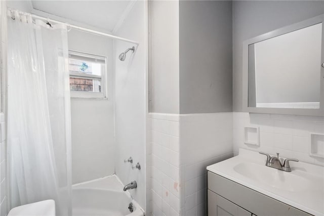 1534 Dormont Ave, Dormont, PA 15216 - full bathroom featuring shower / bathtub combination with curtain, tile walls, vanity, toilet, and a wainscoted wall