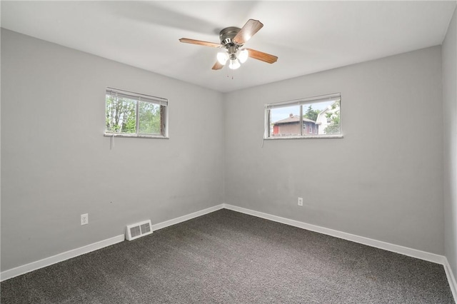 1534 Dormont Ave, Dormont, PA 15216 - spare room with ceiling fan, baseboards, and dark carpet