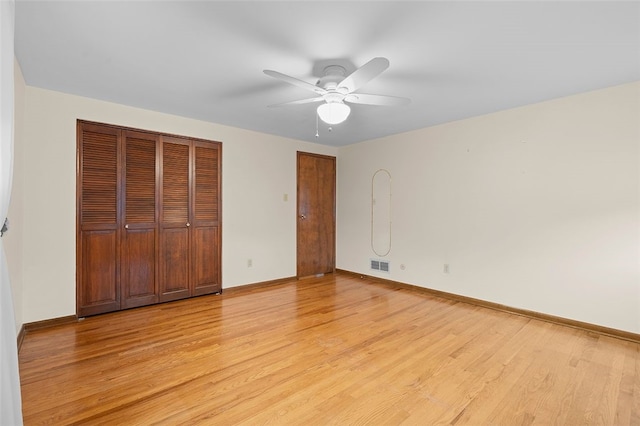 2023 Menold Dr, Mccandless, PA 15101 - unfurnished bedroom featuring light wood-type flooring, baseboards, and a ceiling fan