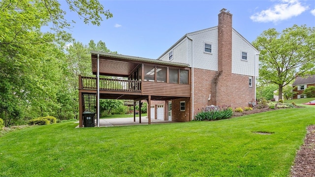 2023 Menold Dr, Mccandless, PA 15101 - rear view of house with brick siding, a yard, a deck, a chimney, and a sunroom