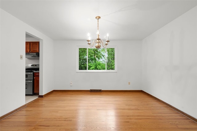 2023 Menold Dr, Mccandless, PA 15101 - unfurnished dining area featuring a chandelier, light wood finished floors, and baseboards