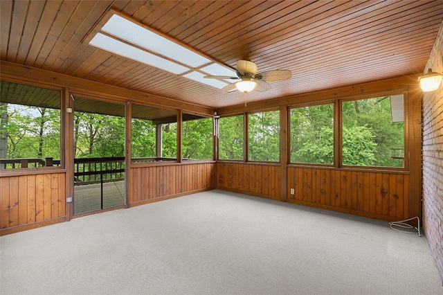 2023 Menold Dr, Mccandless, PA 15101 - unfurnished sunroom featuring a ceiling fan, healthy amount of natural light, carpet floors, wooden walls, and wooden ceiling