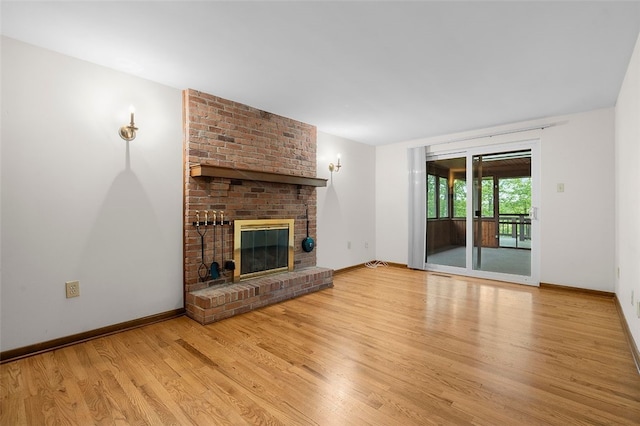 2023 Menold Dr, Mccandless, PA 15101 - unfurnished living room featuring wood finished floors, a brick fireplace, and baseboards