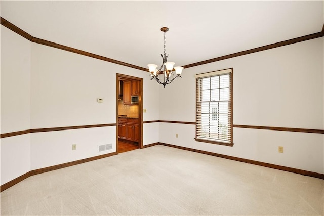 unfurnished room with light colored carpet, a chandelier, crown molding, and baseboards