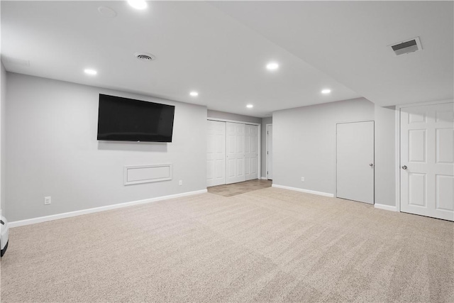 finished basement with recessed lighting, baseboards, and carpet floors