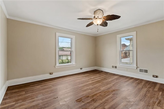 813 11th Ave, New Brighton, PA 15066 - empty room featuring wood finished floors, baseboards, crown molding, and ceiling fan