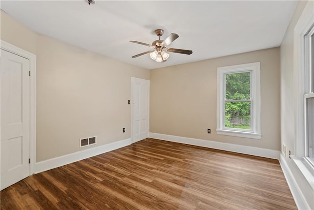 813 11th Ave, New Brighton, PA 15066 - unfurnished room with wood finished floors, baseboards, and ceiling fan
