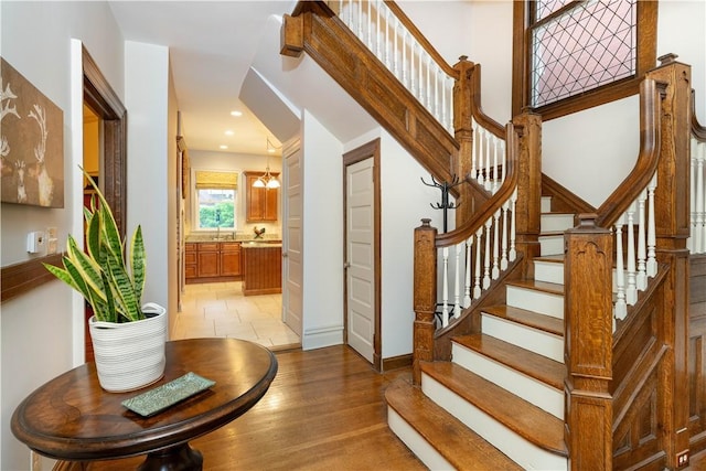 6020 Grafton St, Highland Park, PA 15206 - stairs featuring wood finished floors and recessed lighting