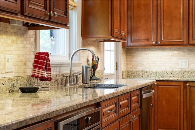 6020 Grafton St, Highland Park, PA 15206 - kitchen featuring backsplash and light stone counters