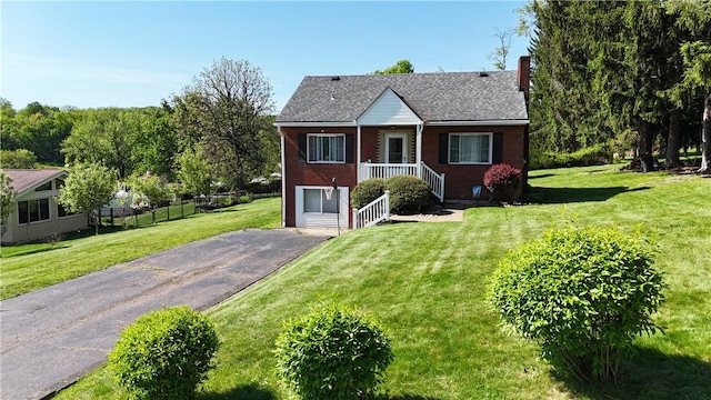 116 Diebold Rd, Robinson Twp Nwa, PA 15136 - view of front facade with a chimney, brick siding, and driveway