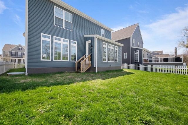 back of property featuring entry steps