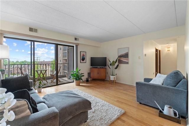 5600 Munhall Rd Unit 517, Squirrel Hill, PA 15217 - living area with wood finished floors and baseboards